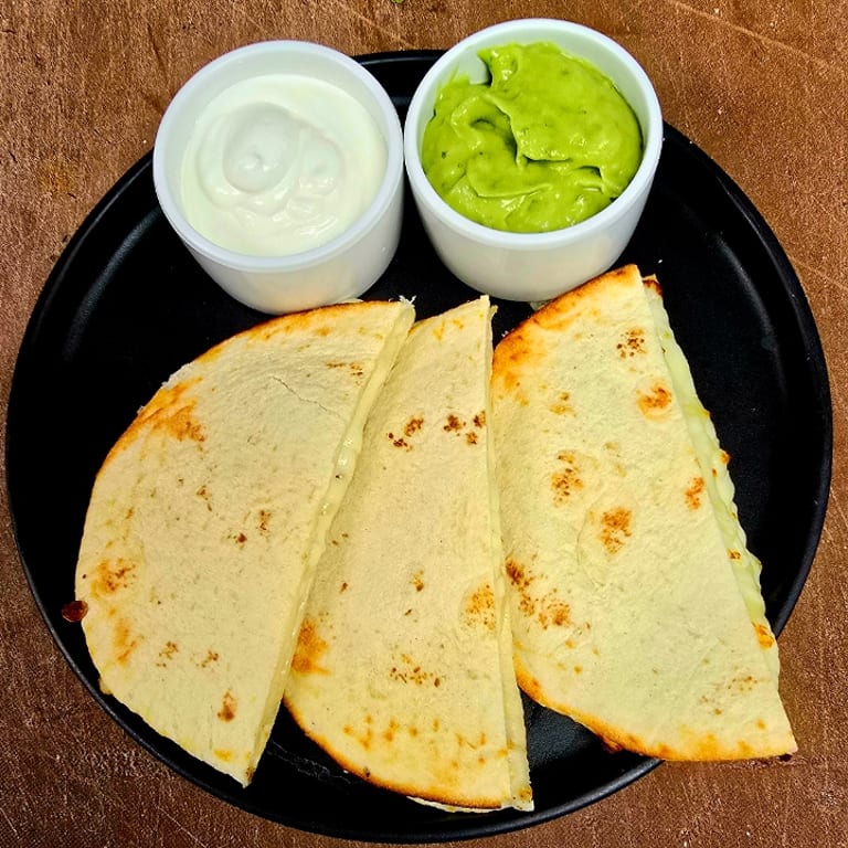Indulge in Our Quesadilla